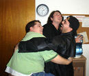Dave and Joe hug Steve